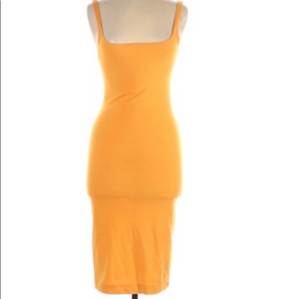 Form fitting marigold/orange dress